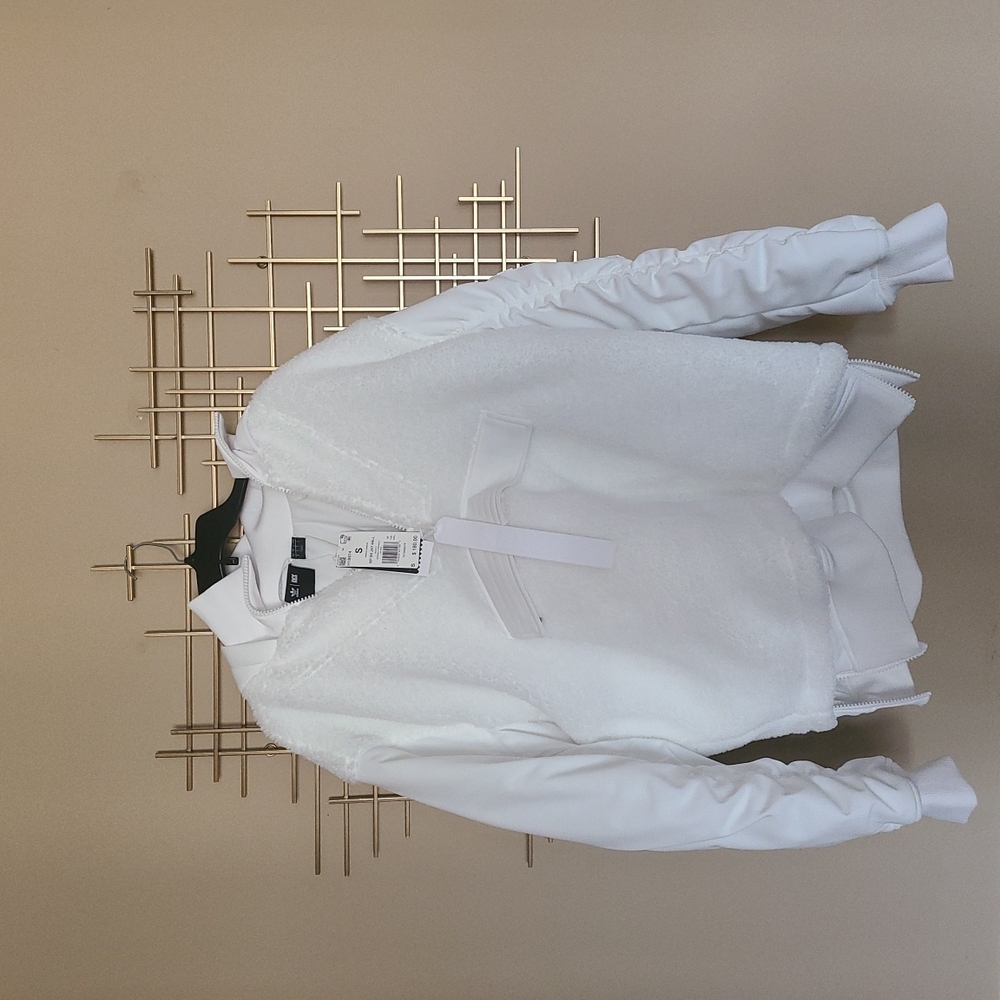 Ivy Park (Icy Park Collection x Adidas). Gender Neutral size small.